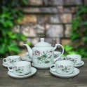 Bộ ấm chén sứ CK quai cong hoa sen (Trắng)